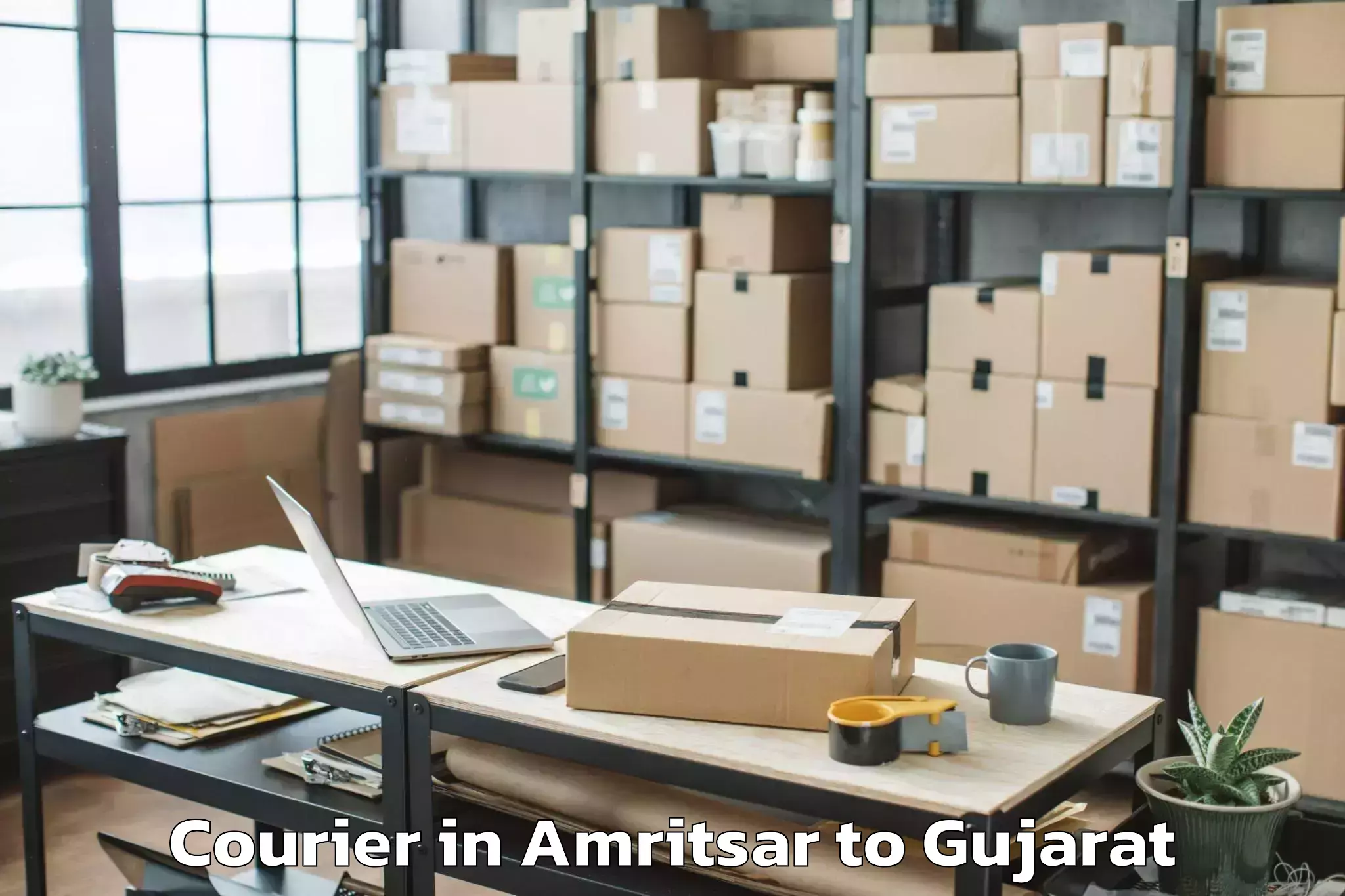 Easy Amritsar to Girgadhada Courier Booking